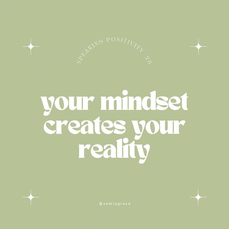 the words, your mindset creates your reality are written in white on a green background