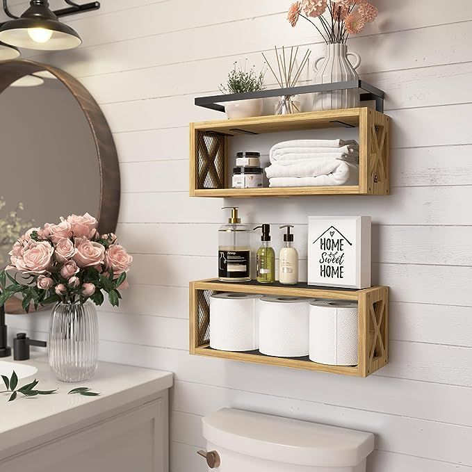 two wooden shelves holding toiletries and flowers in a bathroom