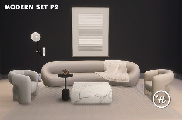 a modern living room set up with white furniture