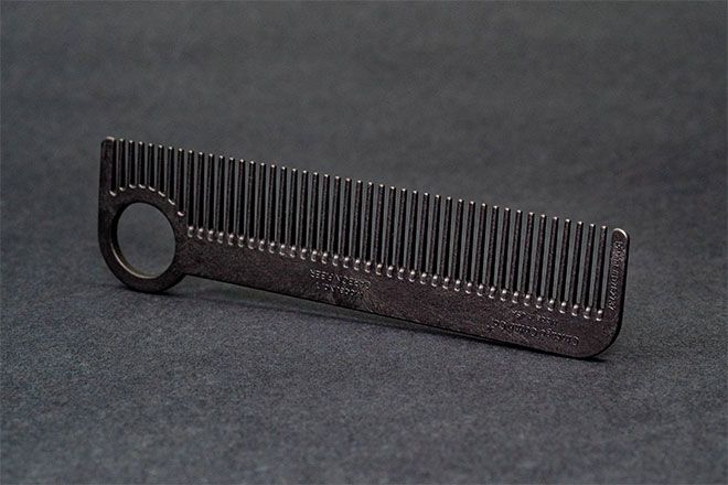 a black comb is sitting on a table