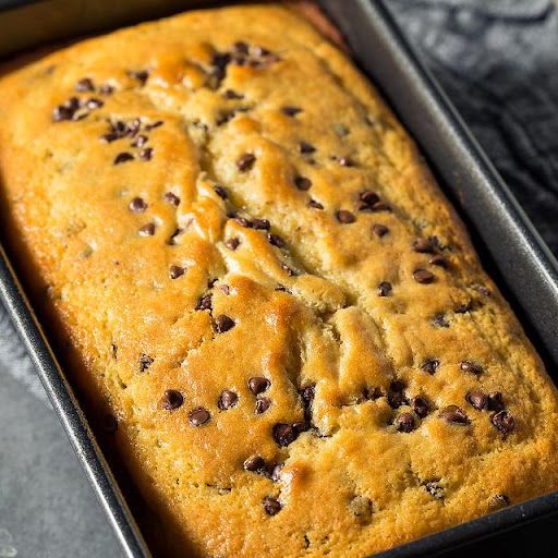 a loaf of chocolate chip bread in a pan