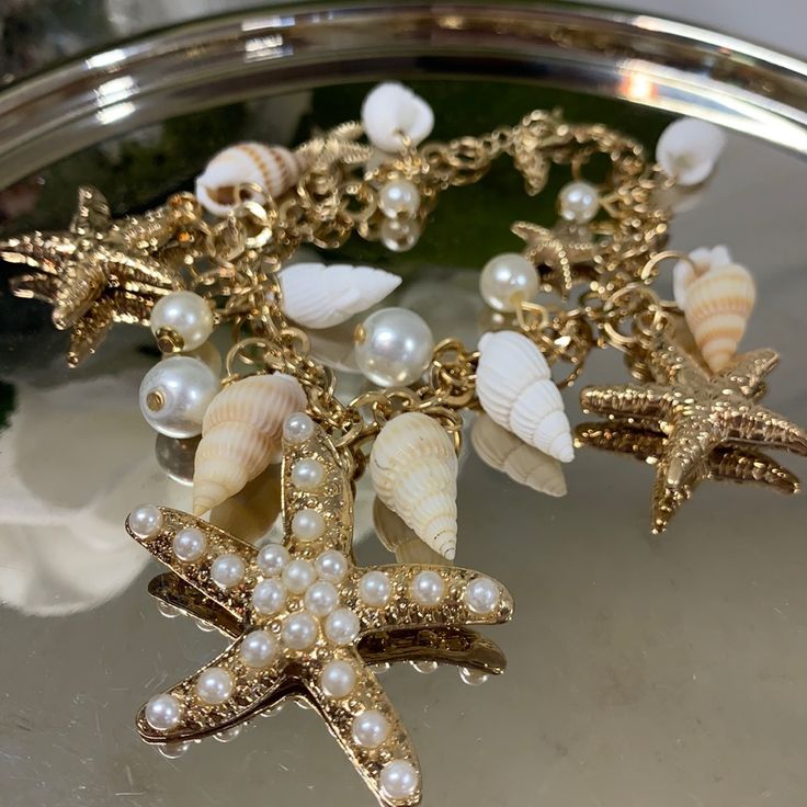 New Without Tags Shiny Gold And White Seashells Fun Summer Bracelet! Elegant Starfish Bracelets For Beach, White Shell Bracelets For Beach Season, White Shell Jewelry With Starfish Charm, Elegant White Jewelry For Beach Season, White Starfish Jewelry For Beach, White Starfish Shell Gift, White Starfish Jewelry For Beach Season, White Starfish Charm Bracelet, Beachy White Starfish Bracelet