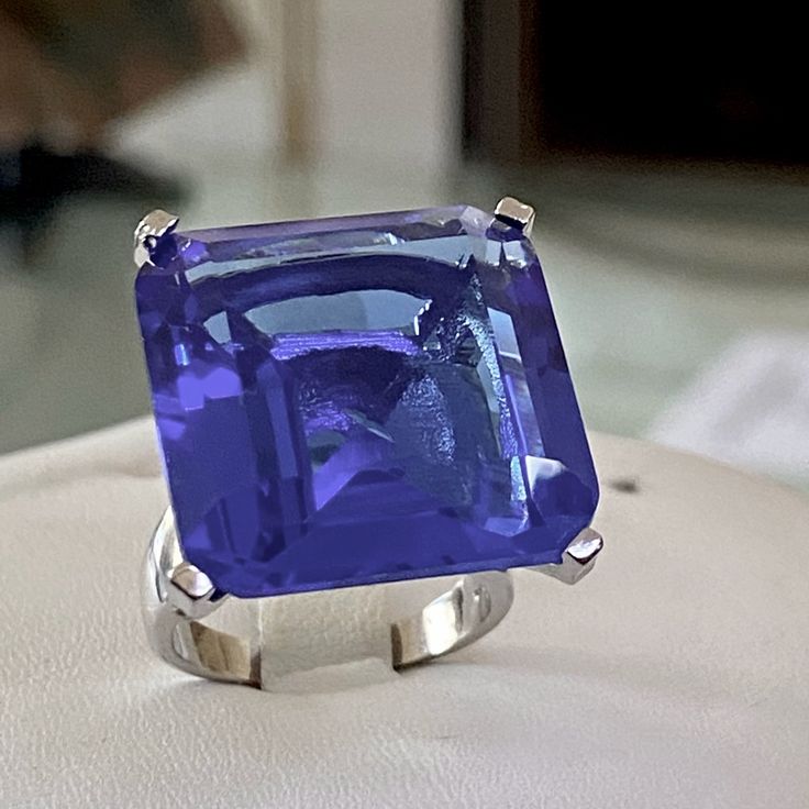 Fabulous 22x22mm Of Princess Cut Violet Tanzanite Cz Set In Sterling Silver Ring . Pictures Are Taken In Different Lightings To Capture The Magnificent Color Of This Gem Comes In An Elegant Gift Box And A Silk Pouch . Silver Sapphire Ring For Party, Formal Blue Tanzanite Gemstones, Blue Evening Rings, Blue Evening Ring Jewelry, Formal Blue Polished Gemstones, Formal Sapphire Gemstones In Sterling Silver, Blue Classic Amethyst Ring For Formal Occasions, Blue Sterling Silver Gemstones For Formal Events, Elegant Blue Round Amethyst Ring