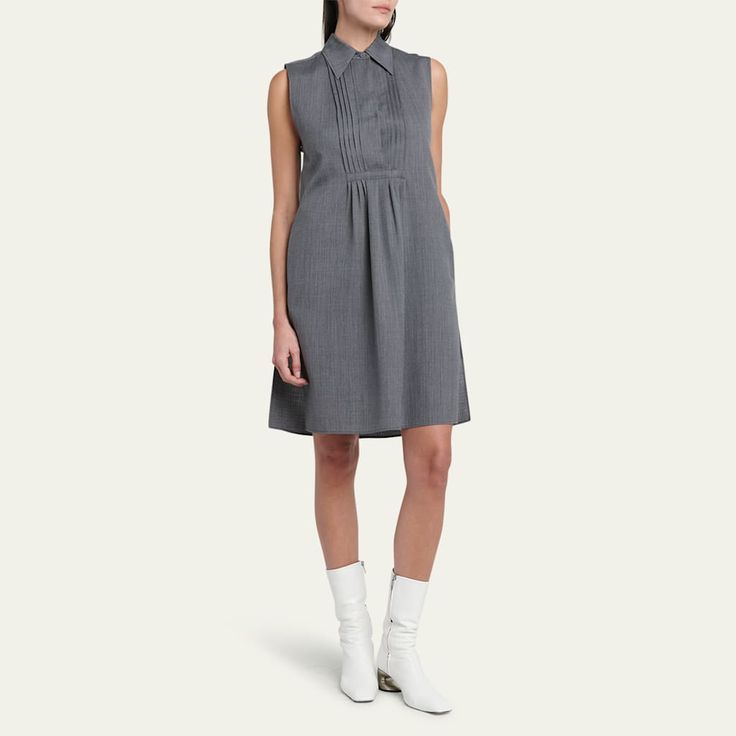 Jil Sander dress with a pintuck bib front Point collar; concealed half-button placket Sleeveless Side slip pockets Short length A-line silhouette Side slits Slipover style Acetate Made in Italy Workwear A-line Mini Dress With Button Closure, Daywear Button-up Shirt Dress With Placket, Vintage Jil Sander, Jil Sander Dress, Luxury Button-up Shirt Dress With Placket, Jil Sander T Shirt, Evening Flats, Cocktail Jacket, Pin Tucks