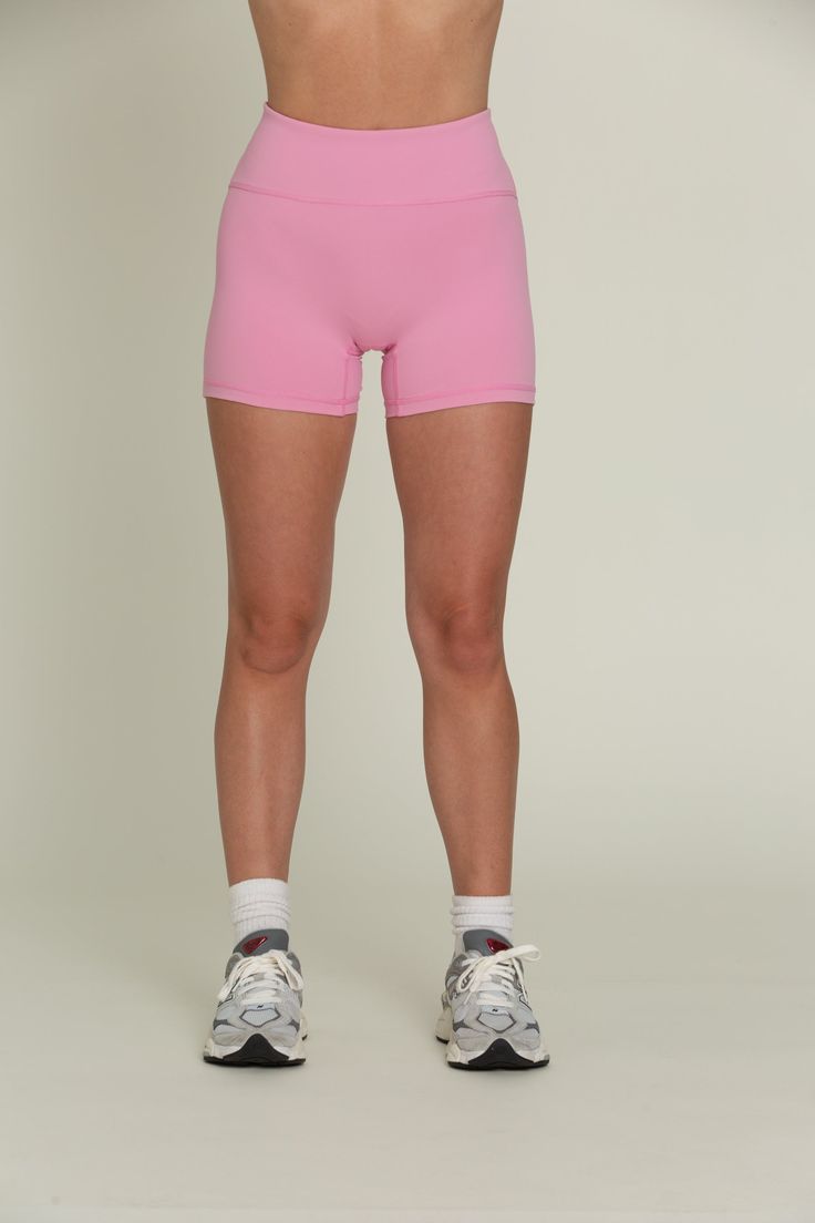 Introducing our True Pink Spandex – a must-have addition to your activewear collection. Crafted from buttery soft, breathable fabric, these spandex offer light to moderate compression for a supportive yet comfortable fit. Perfect for yoga, gym sessions, or lounging, these spandex provide the flexibility and style you need to conquer any activity with confidence. Compressive Running Activewear, Sporty Running Activewear In Recycled Polyester, Compressive Sportswear Activewear For Running, Pink Nylon Activewear With Go-dry Technology, Solid Seamless Activewear For Pilates, High Stretch Nylon Athletic Shorts With Go-dry Technology, Compression Seamless Athletic Shorts For Gym, Solid Color Seamless Fabric Activewear For Pilates, Stretch Athletic Shorts In Recycled Polyester For Running