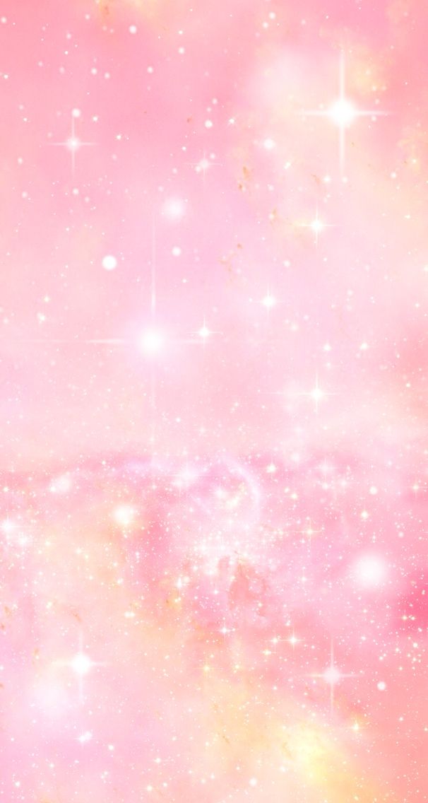 the sky is filled with lots of stars and pink hued clouds, as well as white