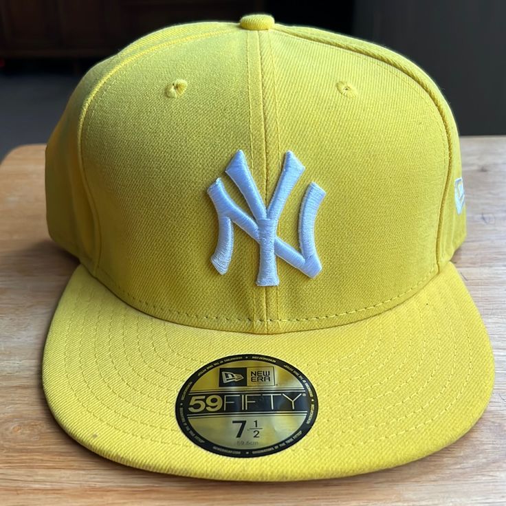 Brand New 59fifty 7 1/2 New Era Yellow And White Yankees Cap, Yankee Sign Center Cat New Era Logo On The Side, Baseball Logo On The Back Yellow Snapback Sports Hat, Sporty Yellow Baseball Cap For Sports, Yellow Casual Snapback Hat, Casual Adjustable Yellow Fitted Hat, Casual Yellow Adjustable Fitted Hat, Yellow Adjustable Fitted Cap, Yellow Snapback Baseball Cap, Yellow Snapback Baseball Cap For Streetwear, Casual Yellow Snapback Hat For Baseball Season