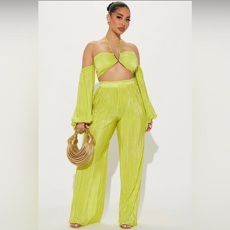 Brand New Off Shoulder Top Cropped Tie Back Back Zipper Closure Wide Leg Pant Elastic Waistband Stretch Inseam: 32" Disclaimer: Pattern Placement May Vary. 100% Polyester Yellow Stretch Sets For Party, Yellow Casual Party Pants, Casual Yellow Sets For Party, Casual Yellow Party Pants, Yellow Sets For Night Out In Summer, Yellow Sets For Night Out In Spring, Yellow Sets For Spring Night Out, Yellow Pants For Spring Party, Yellow Sets For Summer Night Out