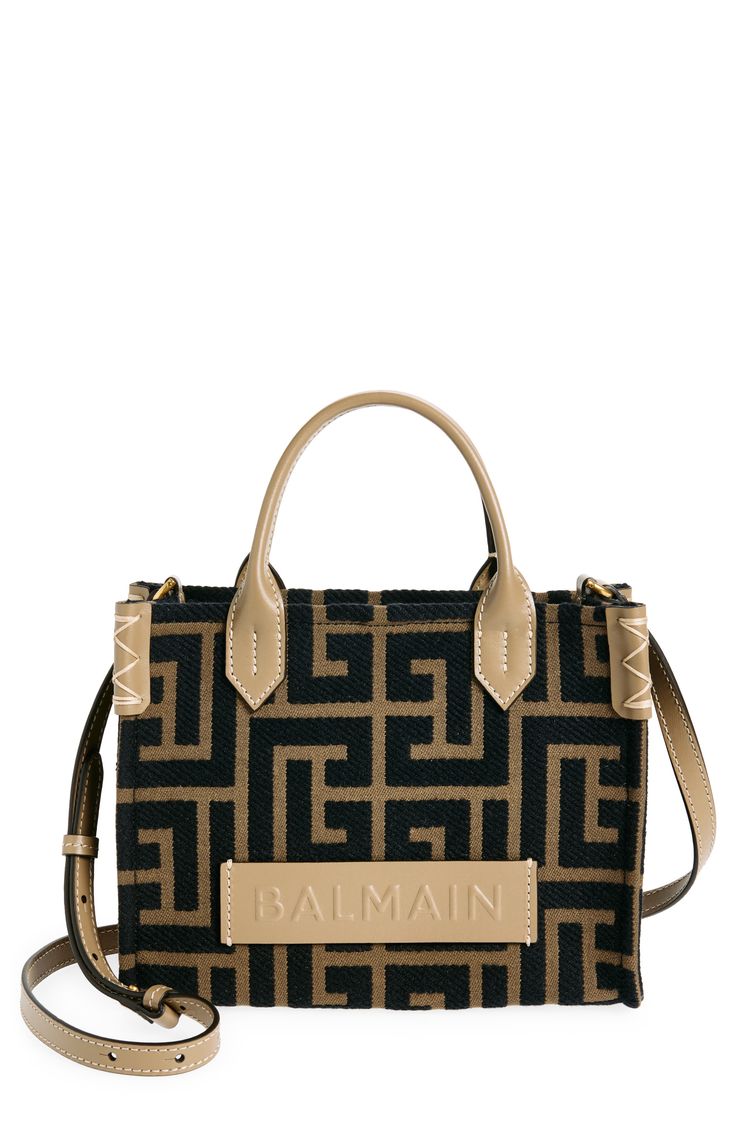 A logo-embossed leather band enhances the iconicity of this PB Labyrinth–embroidered canvas tote, which is crafted in a smaller size but still has room for all the essentials. Bridge-clip closure Top carry handles; removable, adjustable crossbody strap Interior wall pocket Structured silhouette with flat base and protective leather feet Textile with leather trim Made in Italy Designer Handbags Luxury Beige Shoulder Bag With Logo Hardware, Designer Canvas Bags With Logo Hardware, Luxury Beige Shoulder Bag With Embroidered Logo, Luxury Shoulder Bag With Embroidered Logo For Daily Use, Black Shoulder Bag With Embroidered Logo And Double Handle, Designer Beige Shoulder Bag With Embroidered Logo, Black Double Handle Shoulder Bag With Embroidered Logo, Luxury Double Handle Shoulder Bag With Embroidered Logo, Black Canvas Bags With Gold-tone Hardware