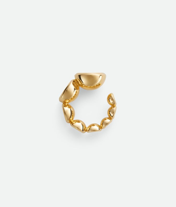 Find BOTTEGA VENETA Concave Ring on Editorialist. 18k gold-finish sterling silver open ring. Width: from 16 to 7 mm | 0.6 to 0.3”. Thickness: from 8.5 to 4.5 mm | 0.3 to 0.2”. Color: Yellow Gold. Sterling Silver. Bottega Veneta Jewelry, Gold Shop, New Bottega, Eyewear Womens, Open Ring, Accessories Necklace, Yellow Gold Rings, Gold Material, Travel Accessories