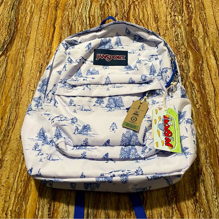 Jansport “Lost Sasquatch” Backpack Large White/Blue Limited Edition Brand New Embrace Adventure With This Jansport "Lost Sasquatch" Backpack! This Limited Edition Backpack Features A Fun And Unique Sasquatch Graphic, Perfect For Adding A Touch Of Personality To Your Daily Routine. It Offers Ample Storage With A Spacious Main Compartment, A Front Utility Pocket, And Comfortable Padded Shoulder Straps. Ideal For School, Travel, Or Outdoor Activities. Brand: Jansport Color: White/Blue Size: 16.5” X White Nylon Hiking Bag, Functional White Hiking Bag, White Nylon Backpack For Hiking, White Nylon Hiking Backpack, White Backpack For Outdoor And Back To School, Functional White Hiking Backpack, Back To School White Outdoor Backpack, White Backpack For Outdoor Activities And School, White Backpack For Back To School And Outdoor Activities