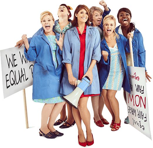 a group of women standing next to each other holding signs