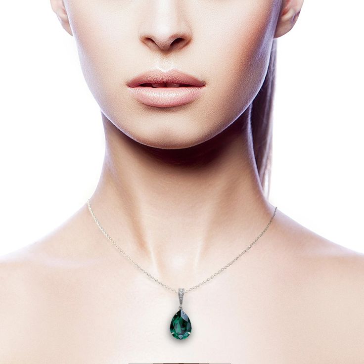 This sparkly May birthstone teardrop pendant necklace makes the perfect gift featuring a stunning emerald crystal, the official birthstone of May. - Made with crystal stones - color: emerald- Available in silver or gold- 18" length with additional 2" extender- Teardrop stone measures 10mm x 14mm- Nickel and lead free- Securely packaged in a signature gift box with microfiber storage pouch- Easy returns Drop Emerald Necklace For Formal Occasions, Formal Teardrop Necklace With May Birthstone, Formal Teardrop Necklace For May Birthstone, Green Teardrop Pendant Drop Necklace As Gift, Green Teardrop Pendant Drop Necklace For Gift, Teardrop Pendant Necklace For Formal Occasions With May Birthstone, Formal Teardrop Pendant Necklaces With May Birthstone, Green Teardrop Necklace For May Birthstone, Formal Teardrop Pendant Necklace With May Birthstone