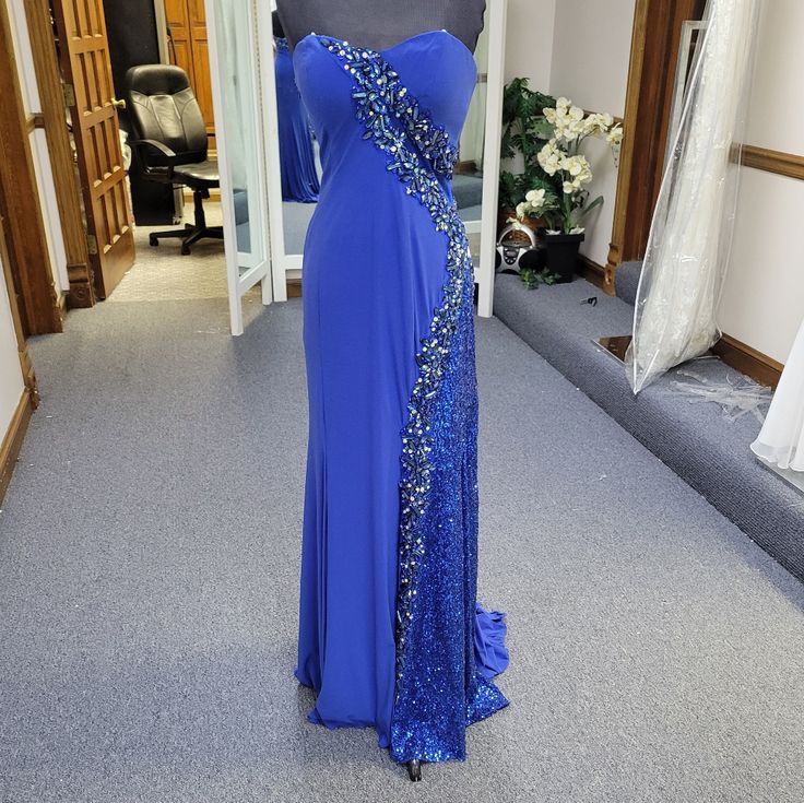 Blue Evening Dress With Rhinestones, Blue Sequined Fitted Gown, Fitted Blue Gown With Rhinestones, Blue Fitted Gown With Rhinestones, Blue Stretch Evening Dress, Glamorous Blue Rhinestone Dress, Blue Rhinestone Floor-length Dress, Blue Embellished Fitted Evening Dress, Blue Stretch Evening Dress For Prom