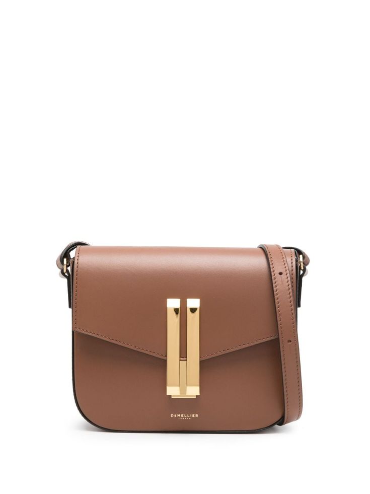 DeMellier The Vancouver Crossbody Bag - Farfetch Luxury Cognac Shoulder Bag With Metal Hardware, Classic Cognac Shoulder Bag With Gold-tone Hardware, Timeless Cognac Shoulder Bag With Adjustable Strap, Designer Brown Flap Bag For Business, Timeless Cognac Shoulder Bag With Detachable Strap, Timeless Cognac Shoulder Bag With Gold-tone Hardware, Designer Brown Satchel With Turn-lock Closure, Luxury Brown Flap Bag With Adjustable Strap, Luxury Brown Saddle Bag With Turn-lock Closure