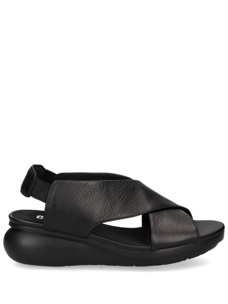 Black leather black calf leather crossover strap detail slip-on style round open toe elasticated slingback strap branded footbed chunky rubber sole Camper Sandals, Camper Shoes, Chunky Sandals, Black Wedge Sandals, Leather Sandals Women, Slingback Sandal, Sandals Black, Environmental Impact, Leather Top