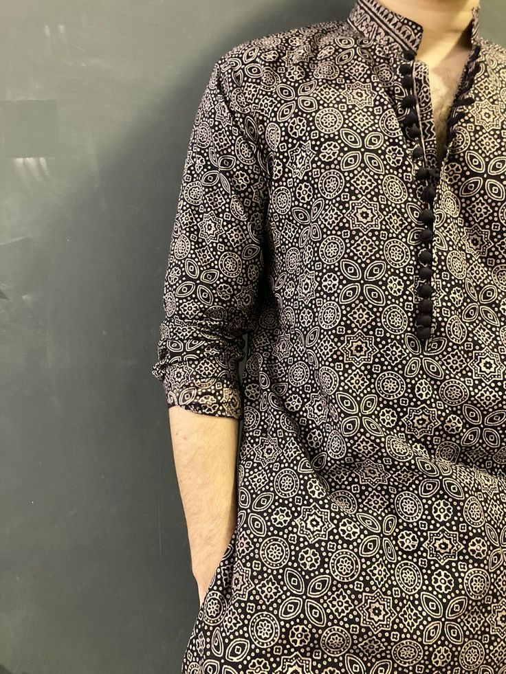 Men also wear traditional ajrak looks smart…natural dyed block printed ajrak in fabric lawn and cotton…#ajrak #fashion #trends #handmade Ajrakh Kurta Designs For Men, Trendy Kurta For Men, Trending Kurta For Men, Boy Kurta Design, Ikkat Kurta Designs, Printed Kurta For Men, Kurta Designs Men's, Short Kurta For Men, Stylish Boy Clothes