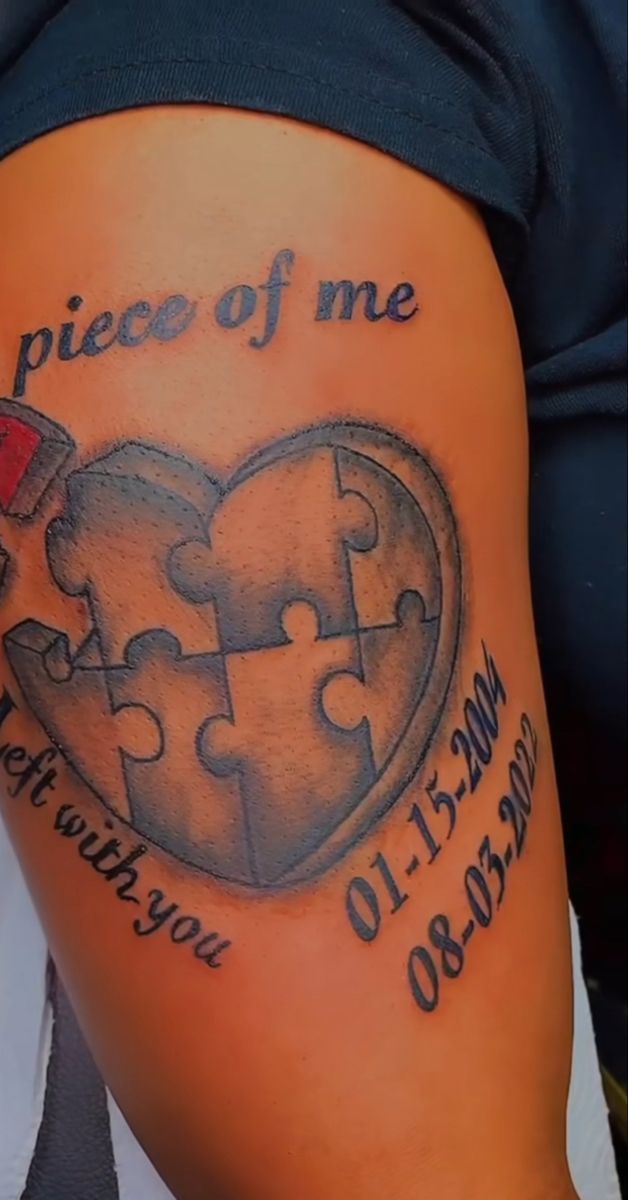 a piece of me tattoo on the side of a woman's thigh with puzzle pieces in it