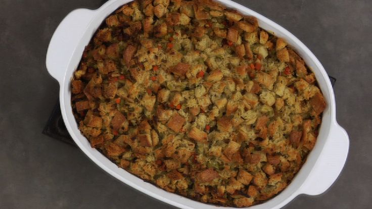 a casserole dish filled with meat and stuffing