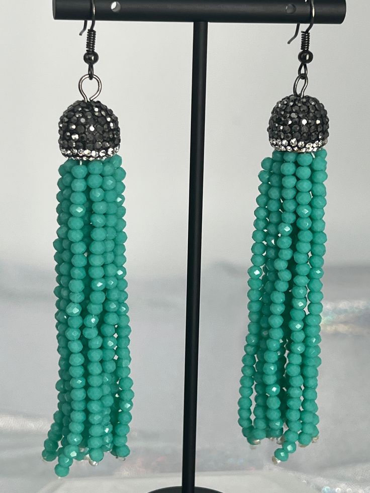 These earrings will add just the right sparkle to your outfit, and the turquoise beads create an interesting look. They go well with most necklines and dress styles, and the stone beads will look and feel amazing. Your Outfit, The Stone, Turquoise Beads, Tassel Earrings, Dress Styles, Christmas Sale, Sterling Earrings, Stone Beads, Rainbow Colors