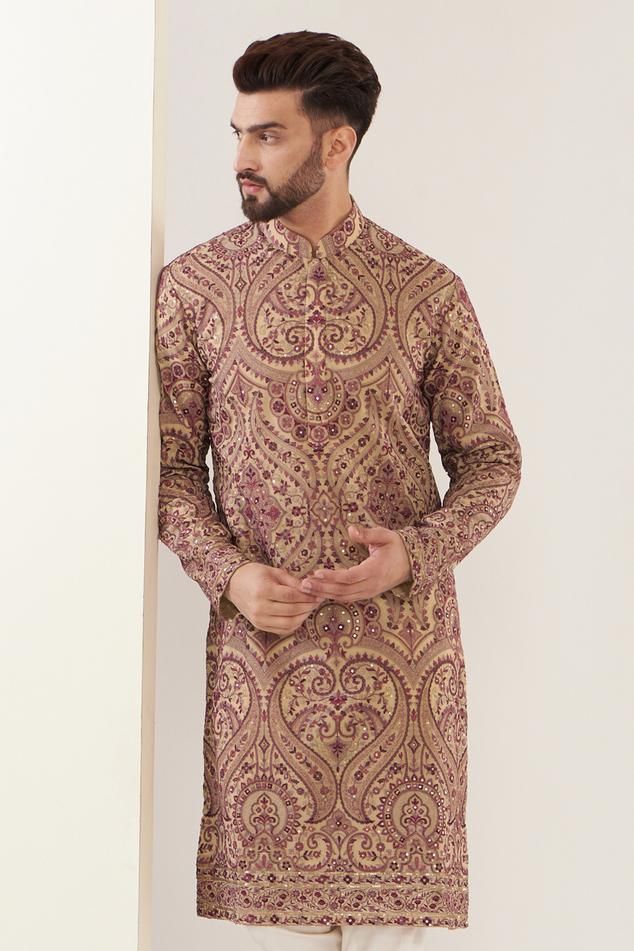 Beige jamawar sherwani with detailed Kashmiri embroidery.
Components: 1
Pattern: Embroidered
Type Of Work: Kashmiri
Neckline: Mandarin
Sleeve Type: Straight Full
Fabric: Georgette
Color: Beige
Other Details: 
Sequin highlights
Note: Pant worn by the model is not for sale
Occasion: Wedding - Aza Fashions Bollywood Style Kurta With Dabka Work On Brocade, Semi-stitched Embroidered Jamawar Sherwani, Embroidered Semi-stitched Jamawar Sherwani, Festival Jamawar Churidar With Naqshi Detail, Traditional Nehru Jacket In Raw Silk With Naqshi Detailing, Traditional Raw Silk Nehru Jacket With Naqshi, Traditional Nehru Jacket In Raw Silk With Naqshi, Bollywood Style Jamawar Kurta With Dabka, Diwali Nehru Jacket With Zari Work In Jamawar