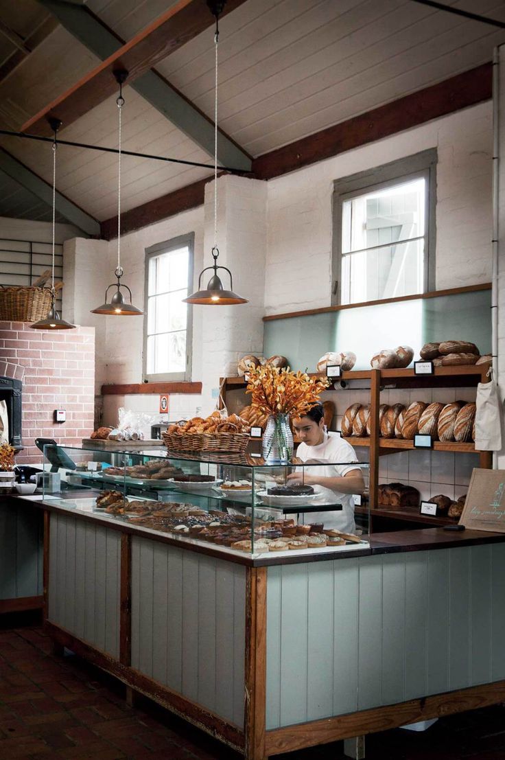 a bakery filled with lots of bread and pastries