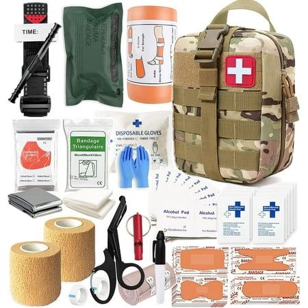 the contents of a medical kit including bandages, scissors and other items are shown in this image