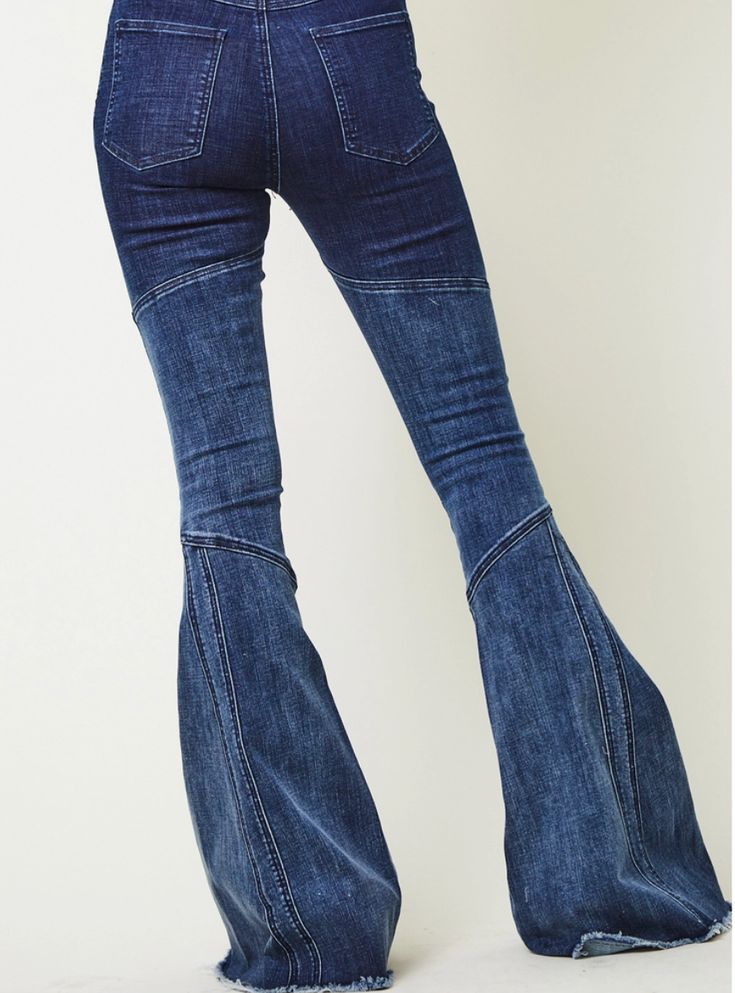 Your new favorite jeans! These paneled bell bottoms are *the* moment! Stretch denim makes them comfortable and worth wearing. Runs true to size. Model is wearing size small. Questions about fit? Email Support@LillaCavallo.com for additional help with choosing the perfect size for you! Fitted Denim Blue Bottoms With Flared Hem, Trendy Medium Wash Flared Hem Bottoms, Trendy Medium Wash Bottoms With Flared Hem, Dark Wash Full Length Flares For Spring, Trendy Medium Wash Flared Bottoms, Spring Dark Wash Full-length Flares, Spring Dark Wash Full Length Flares, Dark Wash Flared Hem Bottoms For Fall, Spring Dark Wash Flare Jeans With Flared Hem