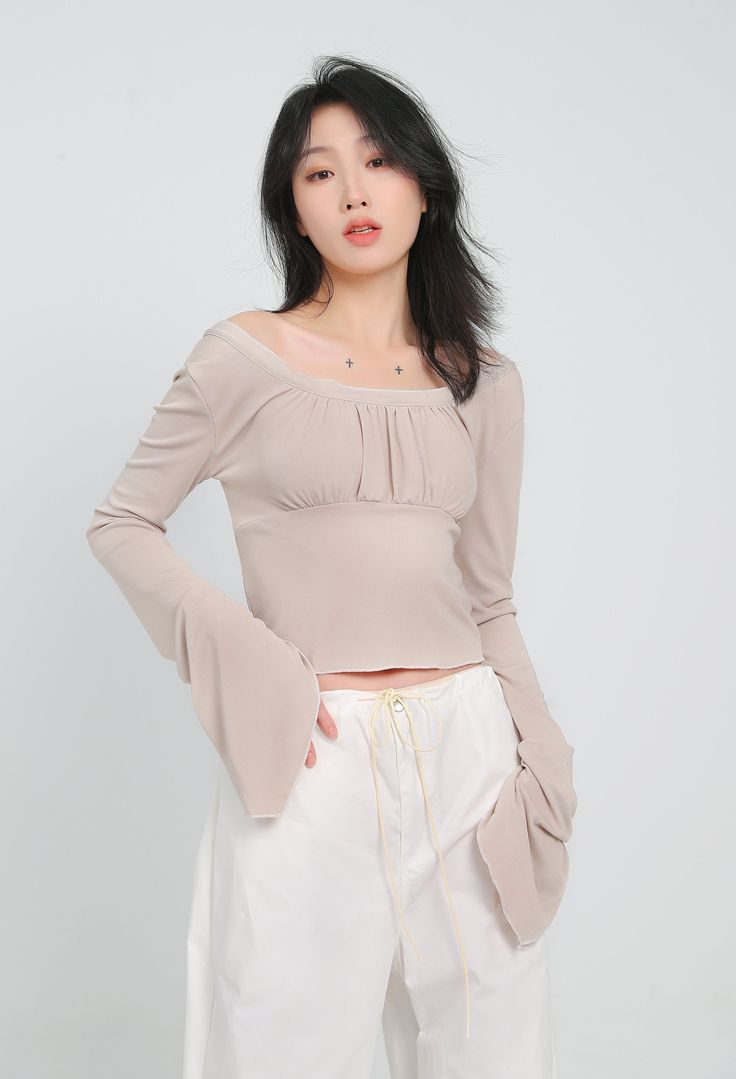 With all the comfort of a casual tee and the style of a dressy top, this crop top is a must-have for your wardrobe. A lightweight and airy fabric makes this crop top a perfect choice for a hot day or a night out on the town. The ruched front detail adds a touch of glamour, while the flare sleeves keep things interesting.
Gender: WomenMaterial: PolyesterClothing Length: ShortSleeve Length: Long SleeveSleeve Type: Angel Sleeve Fitted Cropped Knit Top, Fitted Solid Color Top For Spring, Trendy Fitted Solid Color Blouse, Chic Cropped Knit Top, Cropped Knit Top For Spring, Spring Cropped Knit Top, Chic Cropped Long Sleeve Stretch Top, Fitted Cropped Long Sleeve Top For Spring, Chic Stretch Cropped Long Sleeve Top