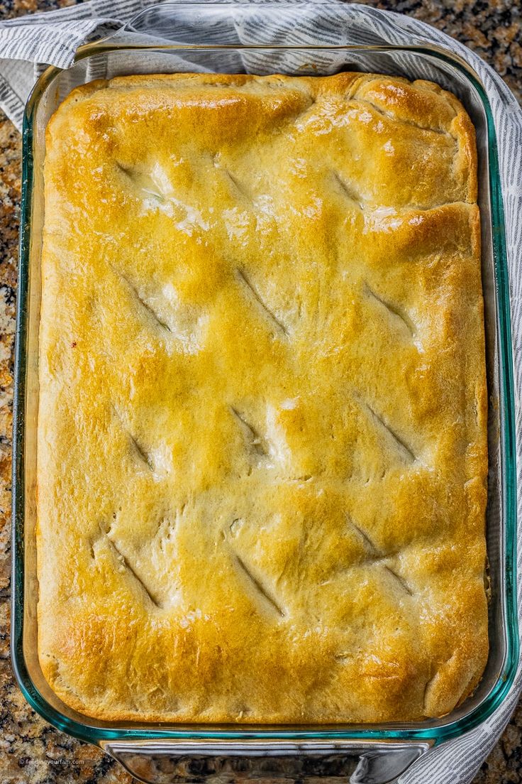 a casserole in a glass dish on a table