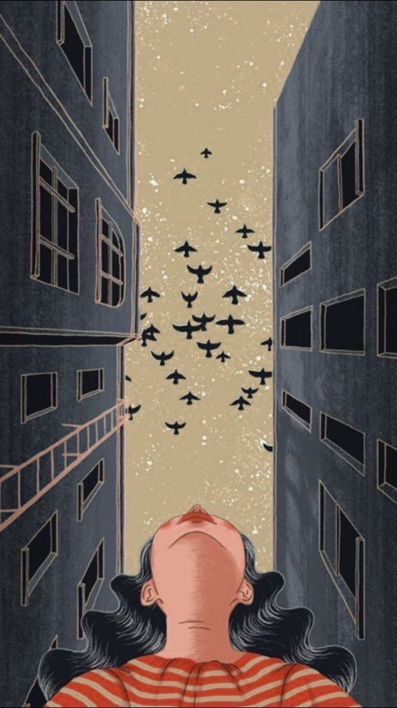 a woman looking up at birds flying in the air above her head and buildings on either side