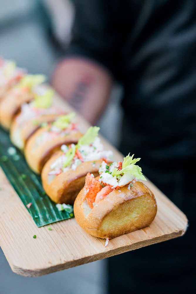 there is a long row of breads with toppings on them