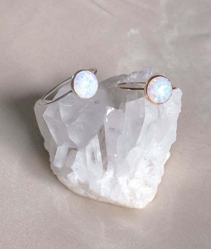 Delicate 14k Gold Filled or Sterling Silver Opal Ring is absolutely stunning with its reflects of violets, blues and pink. Opal is the birthstone for all our October born babes. ………………………………….DETAILS•STONE is Conflict Free Synthetic Opal, measuring 8mm •BAND is 14k Gold Filled or .935 Argentium Silver •WATERPROOF rings can be worn all-day •SIZE INCLUSIVE and made to order Don't know your ring size? Ring Size Guide or Buy Ring Sizer October Born, Sterling Silver Opal Ring, October Birthstone Rings, Silver Opal Ring, Opal Ring Gold, Gold Gemstone Ring, Crystal Healing Bracelets, Synthetic Opal, Waterproof Jewelry