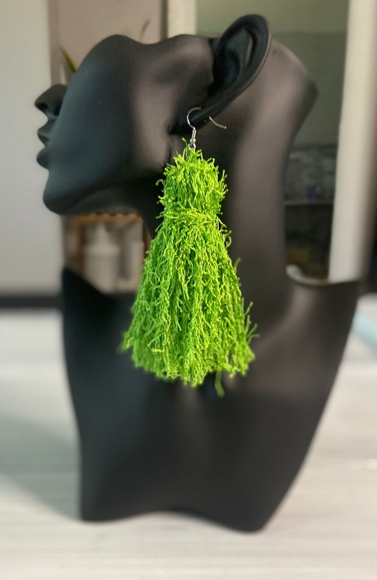 These more elegant tassel earrings are a great statement piece to add to your jewelry collection. They measure 5" with hook included. They are very lightweight. Elegant Tassel Earrings For Beach In Summer, Elegant Summer Chandelier Earrings With Tassels, Elegant Summer Tassel Chandelier Earrings, Elegant Summer Tassel Earrings For Beach, Elegant Tassel Drop Earrings For Summer, Elegant Summer Tassel Drop Earrings, Green Fringe Tassel Earrings For Party, Elegant Fringe Tassel Earrings For Beach, Elegant Tassel Earrings With Fringe For Beach