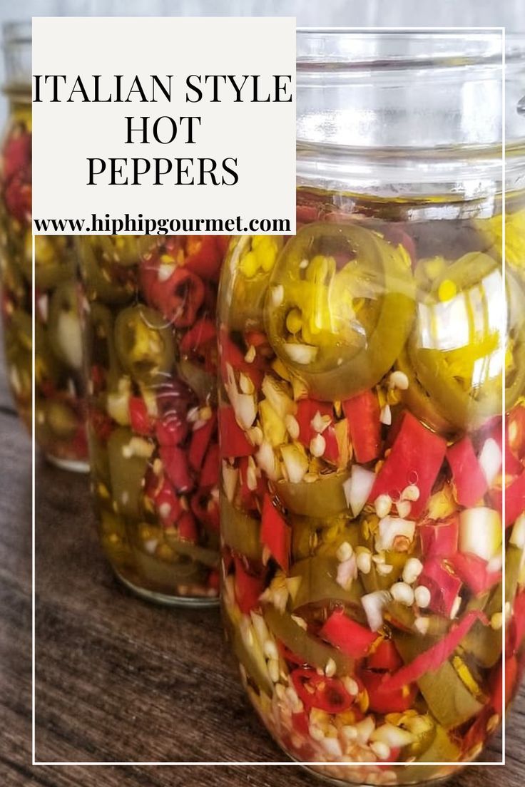 Three mason jars lined up on a table filled with sliced jalapeños and thai red chilies. Hand holding a spoon in the second jar Canned Hot Peppers Recipes, Hot Pepper Oil Recipe, Pickling Hot Peppers Recipe, Pasta With Eggs, Peppers In Oil, Canning Hot Peppers, Canning Peppers, Pickled Hot Peppers, Hot Pepper Recipes