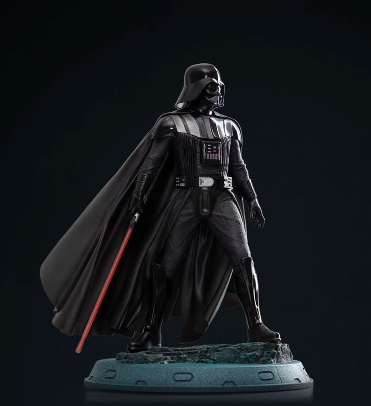 a star wars figurine is shown on a black background with the dark side behind it