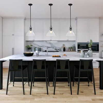 This 1-light mini pendant pairs minimal design with glam style for a dynamic look over your kitchen island or entryway. Rated for dry locations, this light is crafted from iron with a gleaming finish of your choice, and it features a round canopy and a slim, height-adjustable downrod. It comes with a clear glass cone shade for a mix of materials, while the single 60W bulb inside (sold separately) aims the light down while you greet guests or cook up that latest recipe. Plus, this hardwired fixtu Counter Height Chairs, Transitional Pendant Lighting, Single Pendant Lighting, Kitchen Pendants, Kitchen Pendant Lighting, Traditional Lighting, Kitchen Island Lighting, Island Lighting, White Cabinets