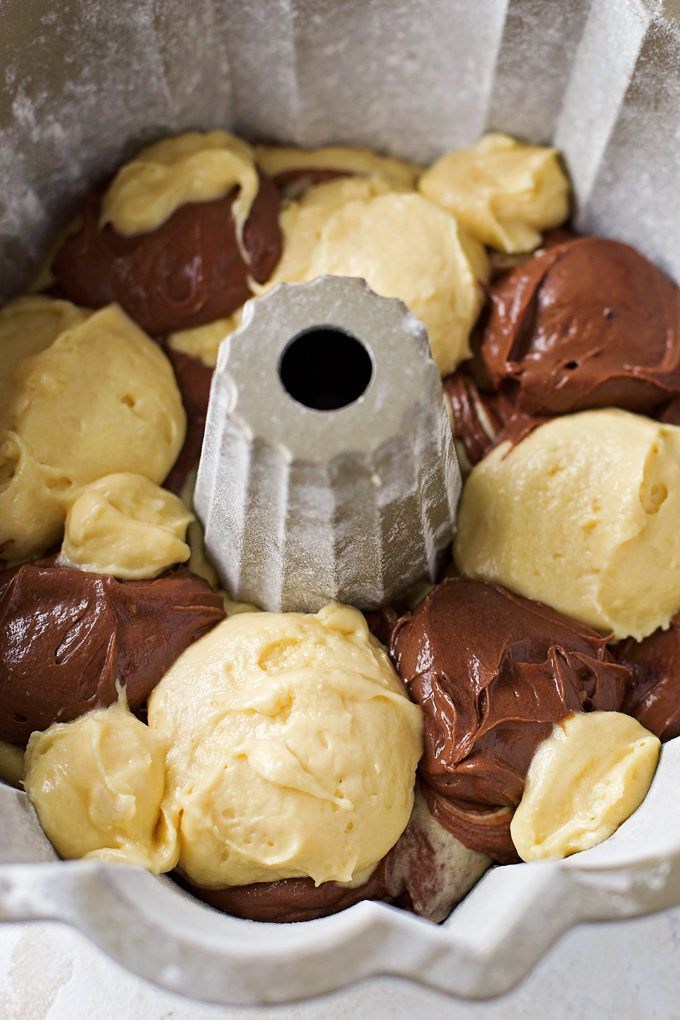 a bundt cake with chocolate frosting in it