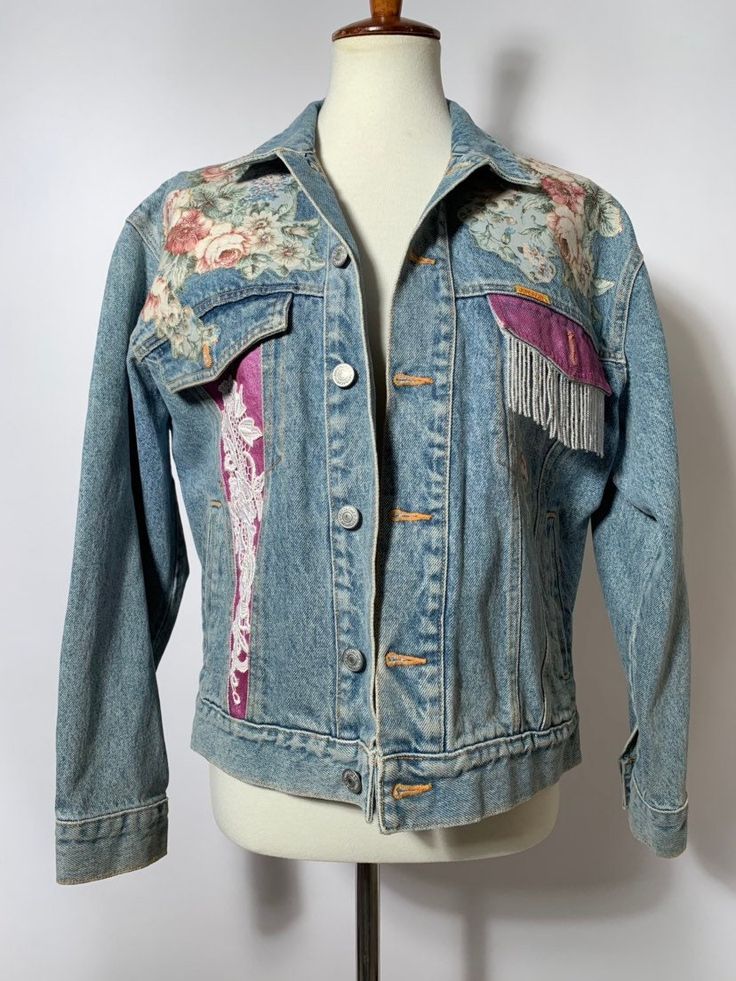 Jordache Vintage Jean Jacket  Take me back to the 80s and 90s! Such a fun statement piece. Floral detailing all over jacket.  --- Condition: Great Vintage Condition. Few normal signs of vintage wear.  --- Size: Fits M best  Shown on size small mannequin  --- All items are uploaded to Instagram first. Follow @bluehoneyshop for first dibs! Retro Spring Outerwear With Patches, 90s Style Spring Denim Jacket, Vintage Denim Jacket For Streetwear In Spring, Vintage Denim Jacket For Spring Streetwear, Vintage Denim Jacket For Streetwear And Spring, Retro Graphic Print Outerwear For Spring, Retro Spring Outerwear With Graphic Print, 90s Spring Outerwear, Vintage Denim Jacket With Graphic Print For Spring