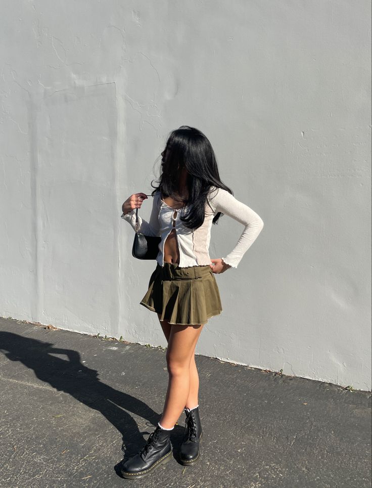 outfit inspo outfit ideas green mini skirt Outfits With Green Mini Skirt, Olive Green Denim Skirt Outfit, Forest Green Skirt Outfit, Mini Green Skirt Outfit, How To Style A Green Skirt, Green Cargo Mini Skirt Outfit, Outfit With Green Skirt, Short Green Skirt Outfit, Green Short Skirt Outfit