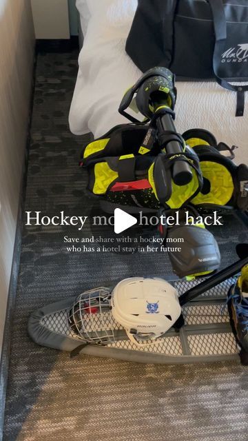 there is a snowboard, helmet and skis on the floor in this room