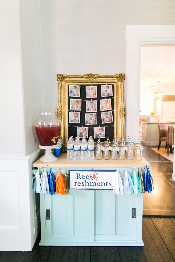 a table with pictures and drinks on it