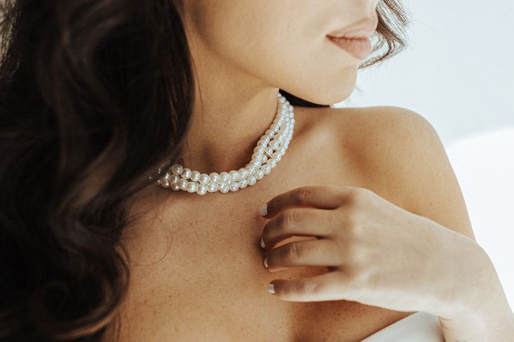 Embrace the elegance of a bygone era with our Pearl Choker. The perfect finishing touch to any bridal look, this vintage-inspired piece exudes Bridgerton vibes. Adorned with luxurious faux pearls, it adds a touch of sophistication and charm. Elevate your style with this must-have accessory. Details: Faux Pearls Final Sale Classic Bridal Necklace For Wedding, Elegant White Bridal Necklace For Wedding, Elegant Pearl Bridal Necklace For Wedding, Elegant Pearl Chain Bridal Necklace, Glamorous Pearl Bridal Necklace For Formal Occasions, Classic Pearl White Bridal Necklace For Wedding, Feminine Pearl Embellished Necklaces For Wedding, Elegant Pearl White Necklaces For Weddings, Elegant Pearl Charm Bridal Necklace For Wedding