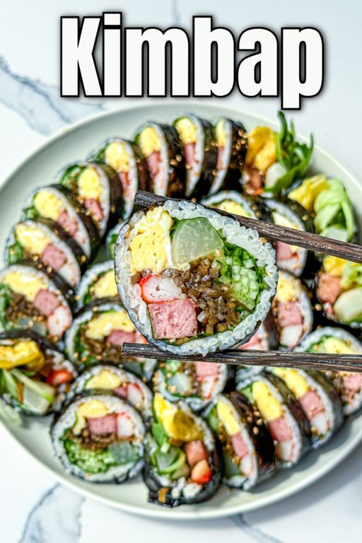 a plate with sushi and chopsticks on it that says kimbap