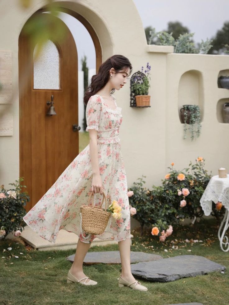 Get tea party ready this summer in this lightweight chiffon printed midi dress with a square neckline, braided details, short puff sleeves, flecks of gold and concealed back zipper. Lined. S: 33" chest, 27" waist, 44" lengthM: 34.5" chest, 28.5" waist, 44" lengthL: 36" chest, 30" waist, 44" length Blush Midi Dress, Dress Cream, Flower Print Dress, French Chic, Overall Dress, Printed Midi Dress, Cream Dress, Sweater Blouse, Cardigan Jacket