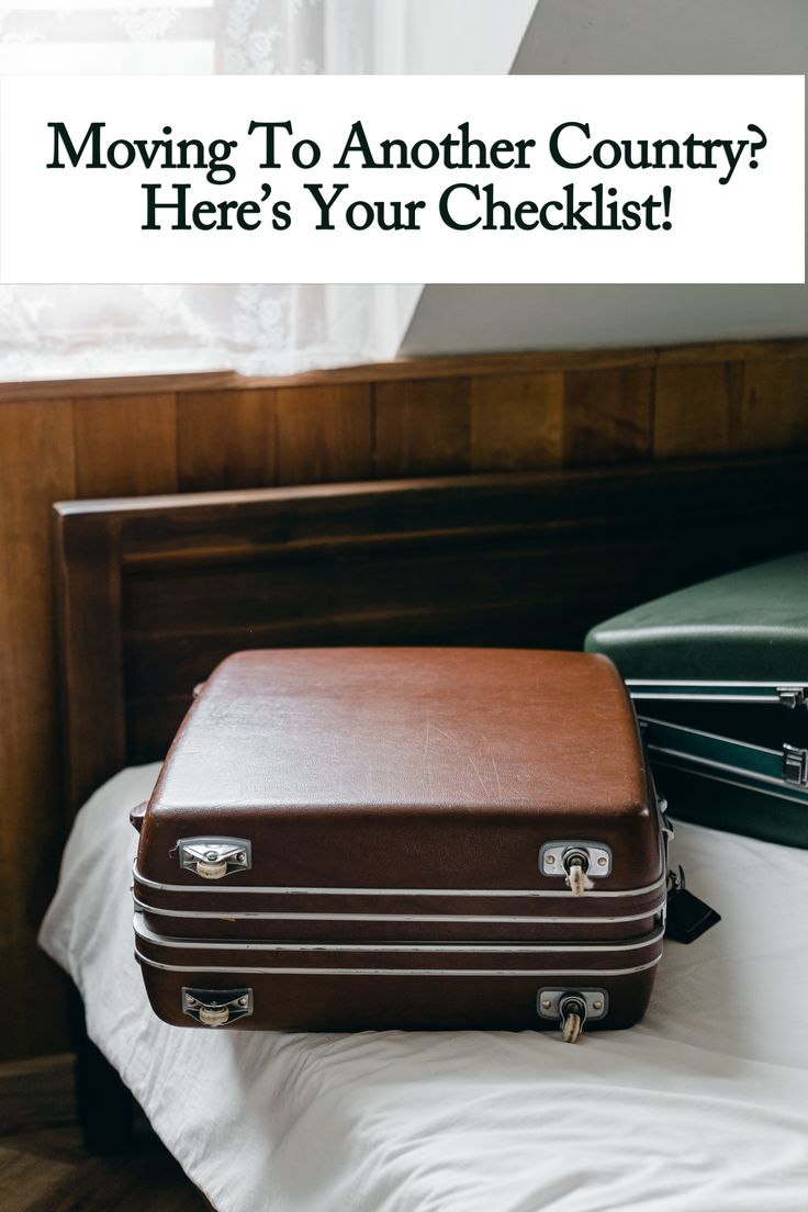 two suitcases sitting on top of a bed with the words moving to another country here's your checklist