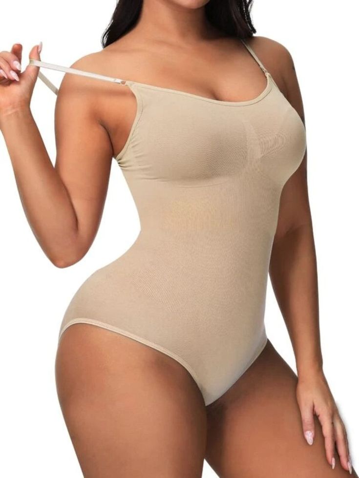 Discover a new level of comfort with our Plain Shapewear Casual Bodysuit. Embrace a sleek look with its light support level, while the high-stretch knitted fabric offers freedom in movement. Unveil confidence effortlessly in this casual, plain-patterned briefs bodysuit. Elevate your everyday wear with a touch of understated elegance. Features: Style: Casual Pattern Type: Plain Type: Briefs Support Level: Light Fabric: High Stretch Material: Knitted Fabric Size Chart(in): Size Bust Hip Size Lengt Solid Shaping One-piece Bodysuit, Solid Shaping Full Coverage Bodysuit, Summer Solid Color Elastane Shapewear, Compression Shapewear Bodysuit, Summer Shapewear With Built-in Bra And High Stretch, High Stretch Shapewear With Built-in Bra For Summer, Shaping Seamless Solid Color Bodysuit, Summer Shaping Shapewear With Seamless Construction, Stretch One-piece Bodysuit Shapewear