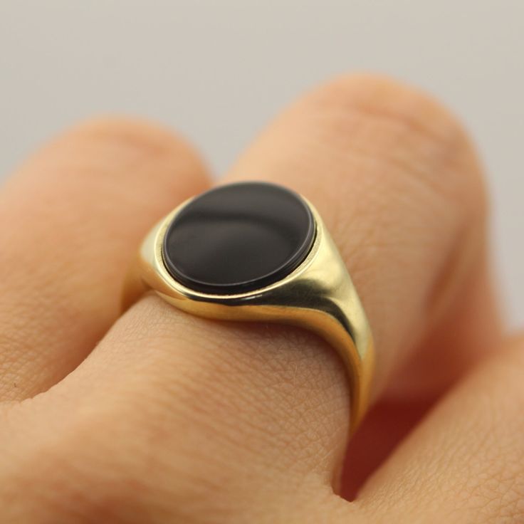 - 14k Yellow Gold- 100% Onyx (Size: 12mm*10mm)- All of our jewelry is handmade in our studio in the U.S. LEARN ABOUT OUR 14K GOLD JEWELRYKnown for its lasting quality, 14k Gold is found throughout our collection of Fine Jewelry. Whether framing 14k Gold earrings, necklaces, rings, or bracelets, this elevated metal is made to last for decades to come. Learn more about our favorite 14k Gold jewelry and how to properly care for your pieces.MEET OUR FINE JEWELRY STAPLEWhat is 14k Gold Made of?14k Go Black Rings Stamped 14k As Gift, Black 14k Stamped Signet Ring As Gift, Black Rings With Polished Edges For Gifts, Black 14k Stamped Signet Ring For Gift, Black Jewelry With Polished Edges For Gift, 14k Gold Signet Ring With Round Stone For Gift, Black Signet Ring With Polished Finish Gift, Spiritual 14k Gold Oval Signet Ring, Signet Ring With Polished Finish And Round Stone