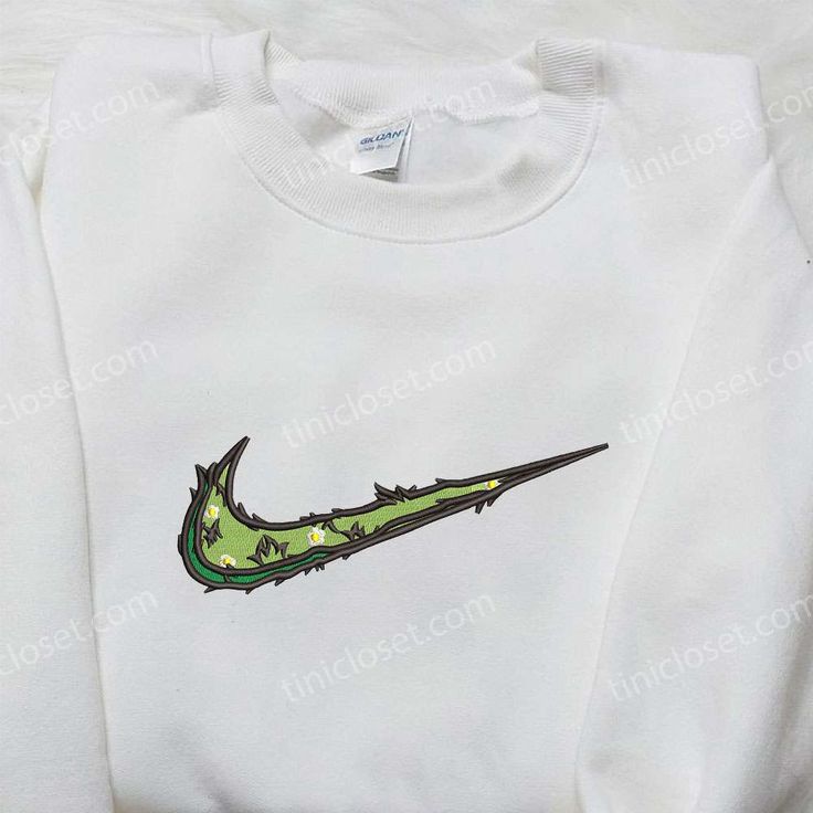 Introducing the Leaves and Flowers x Nike Swoosh Embroidered Hoodie, a fusion of nature and sportswear. Made with premium materials, this hoodie showcases a unique embroidered design that combines the iconic Nike Swoosh with delicate leaves and flowers. Its cozy fit and soft fabric ensure ultimate comfort, while the eye-catching embroidery adds a touch of elegance. Stand out from the crowd with this one-of-a-kind hoodie that seamlessly blends style and performance. Elevate your wardrobe with our Best Birthday Gift Ideas, Nike Inspired, Dallas Cowboys Logo, Best Birthday Gift, Personalized Accessories, Best Birthday Gifts, Adulting Shirts, Nike Swoosh, Embroidered Hoodie