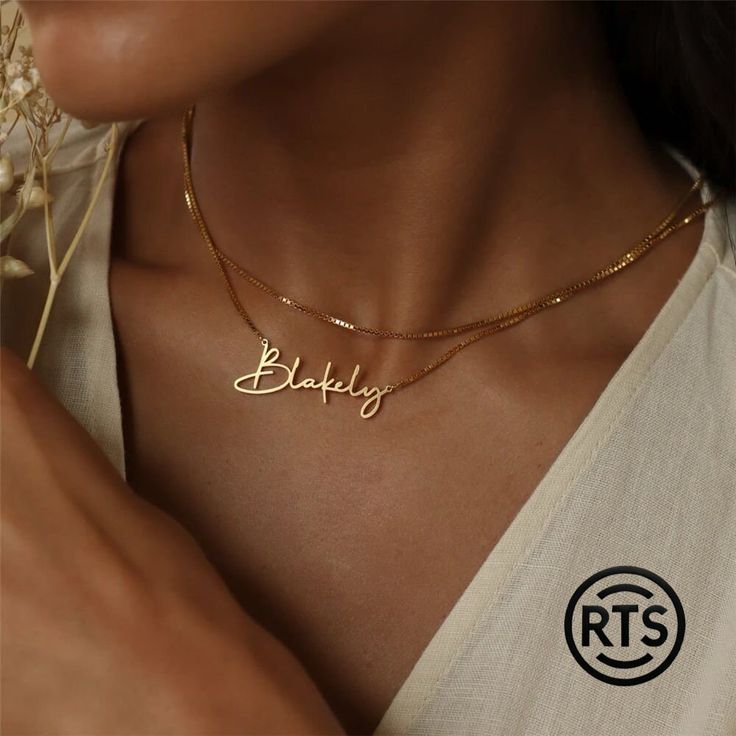 Discover the beauty of our Custom Name Necklace, a timeless piece that lets you carry your name or the name of someone special close to your heart. Crafted with meticulous attention to detail, this elegant necklace features a beautifully scripted nameplate in a luxurious gold-plated finish. Perfect for any occasion, this personalized necklace makes a thoughtful gift for birthdays, anniversaries, graduations, or simply as a treat for yourself. The necklace is designed to add a touch of sophistication and individuality to any outfit. Features: Personalized Design: Customizable with any name or word of your choice, up to 12 characters. Luxurious Finish: High-quality gold plating for a rich, polished look. Elegant Script: Beautifully crafted in an elegant script font that captures the essence Necklace Chain Types, Nameplate Necklace, Gold Name Necklace, Silver Chain Style, Name Jewelry, Custom Name Necklace, Custom Necklace, Perfect Gift For Her, Stainless Steel Necklace